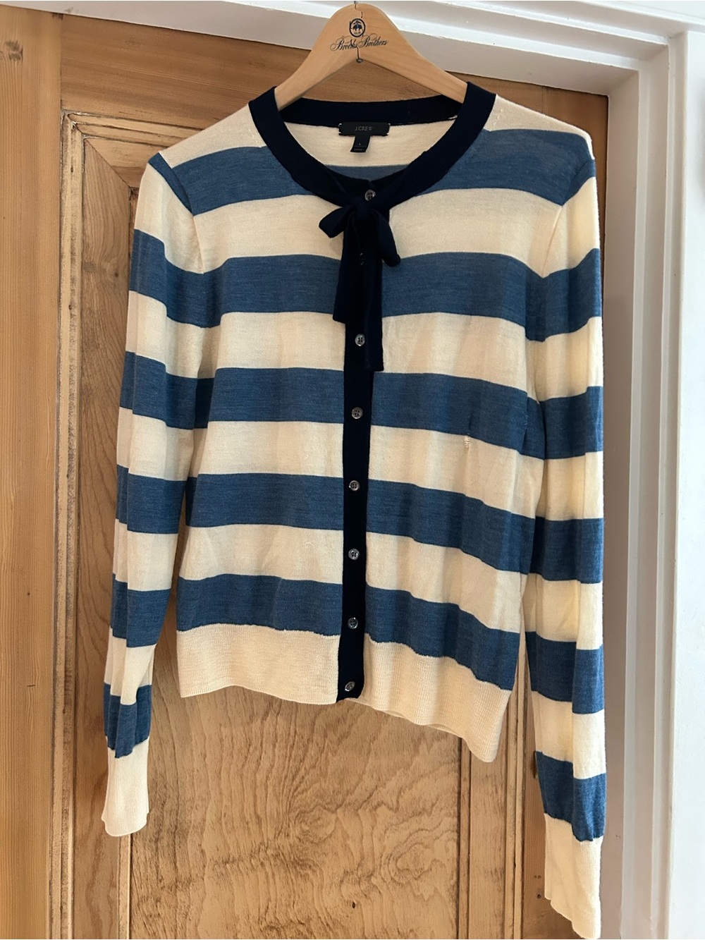 J. Crew Navy and Cream Striped Bow-Tie Cardigan (2 repairs on front left)